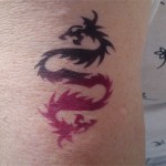 Airbrush Tattoo Drachen auf dem Oberarm