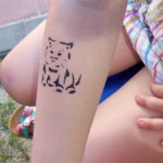 Katzen Tattoo am Arm